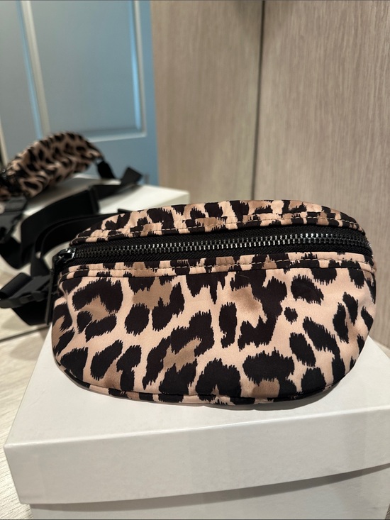 kate spade Handbags - Kate spade nwot animal print
 Crossbody Belt Bag - Black and Tan